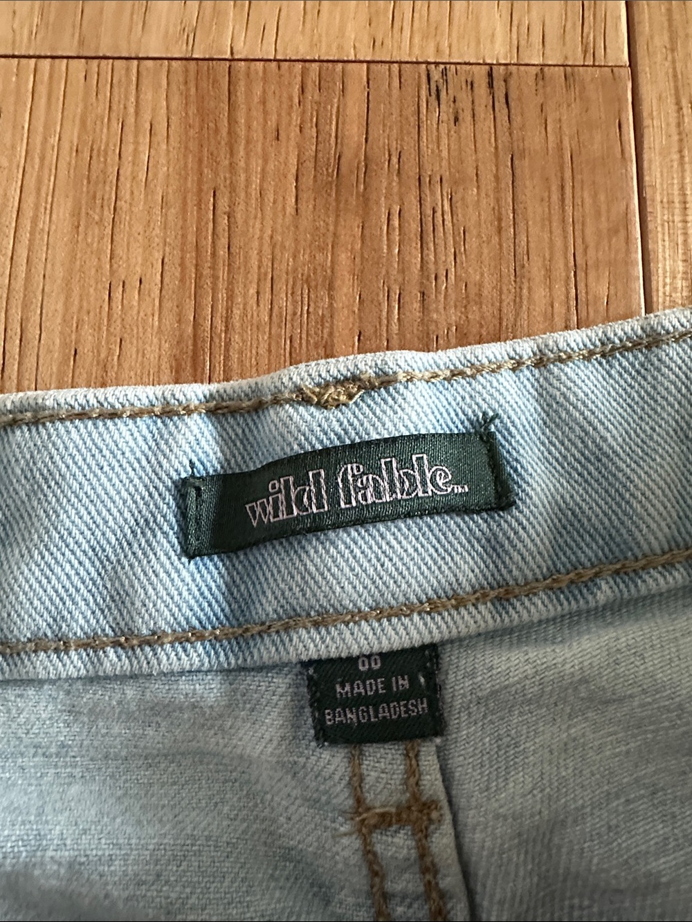 Light Blue high-waisted distressed Denim Shorts - Women - Picture 2 of 4